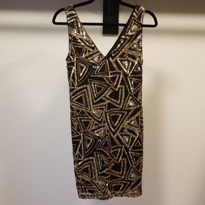 Gold and black sequin mini dress